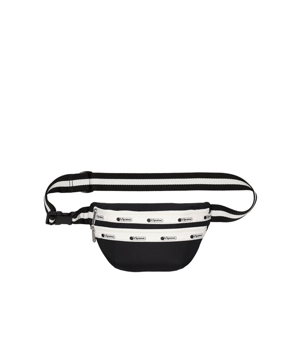 Everyday Belt Bag in black with white trim, featuring a zip main closure, exterior front zip pocket, and an adjustable belt strap.