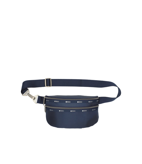 Main product image – Essential Belt Bag in dark blue, showcasing its compact and functional design.