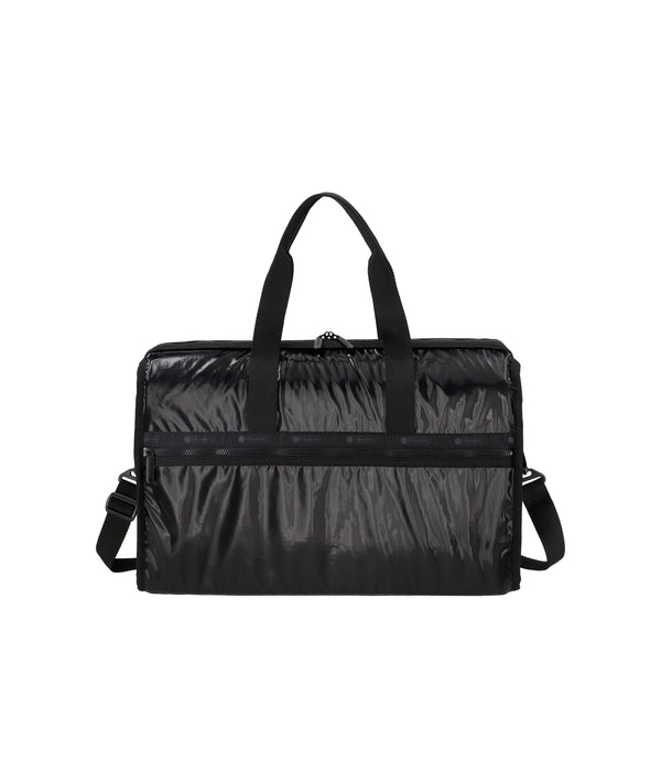 Deluxe Large Weekender in shiny black with dual top handles, zip-top closure, and multiple exterior pockets.